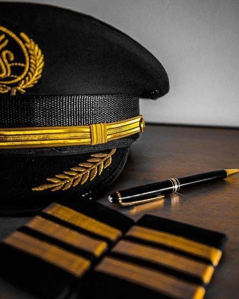 Pilot's cap and epaulets from Pelican Flight School